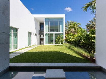 A Bright Modern Concrete Home with Beautiful and Transparent Arrangement on Biscayne Bay by [STRANG] Architecture (7)
