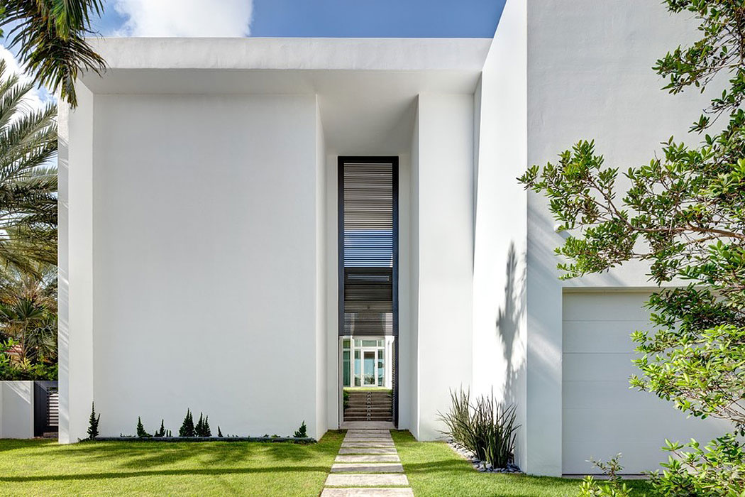 A Bright Modern Concrete Home with Beautiful and Transparent Arrangement on Biscayne Bay by [STRANG] Architecture (8)