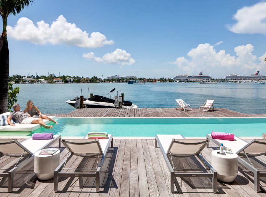 A Bright Modern Concrete Home with Beautiful and Transparent Arrangement on Biscayne Bay by [STRANG] Architecture (9)