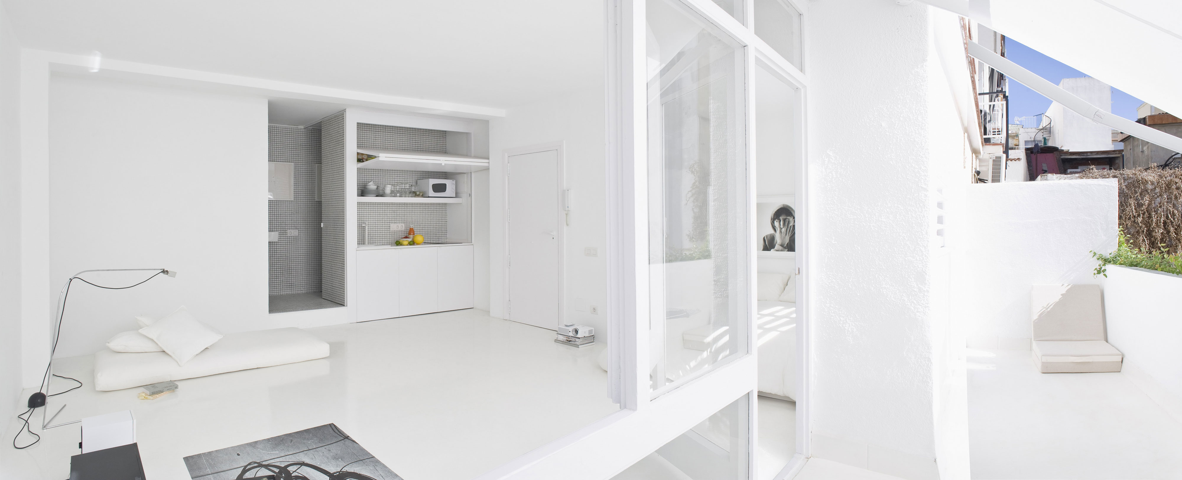 A Bright White Contemporary Apartment for an Art Historian and Curator in Barcelona by CaSA – Colombo and Serboli Architecture (1)