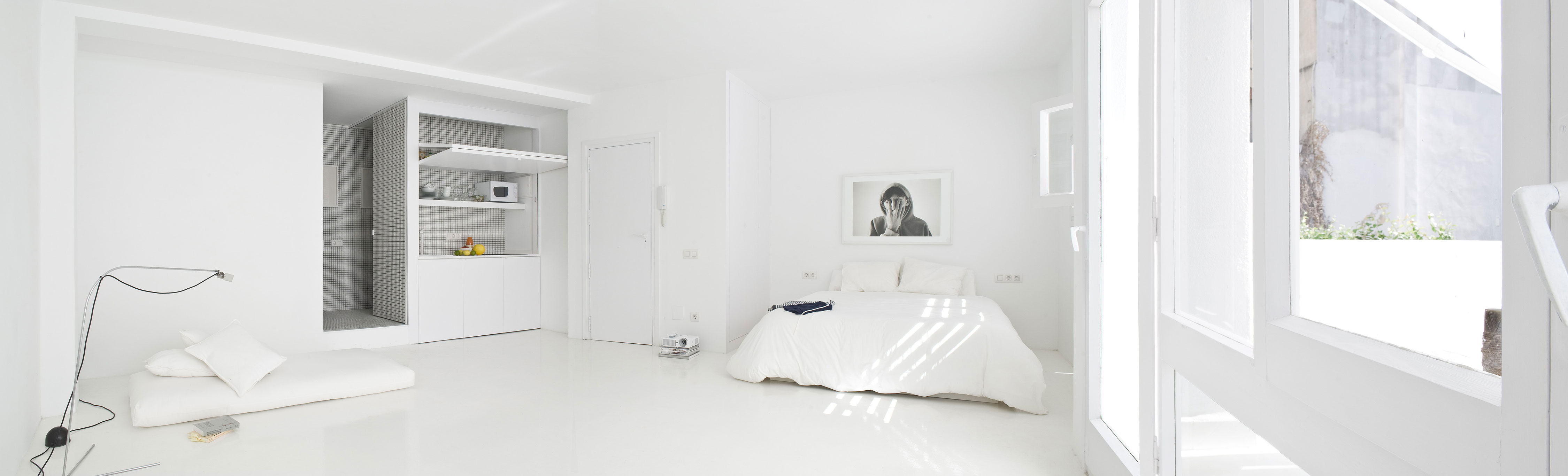 A Bright White Contemporary Apartment for an Art Historian and Curator in Barcelona by CaSA – Colombo and Serboli Architecture (2)