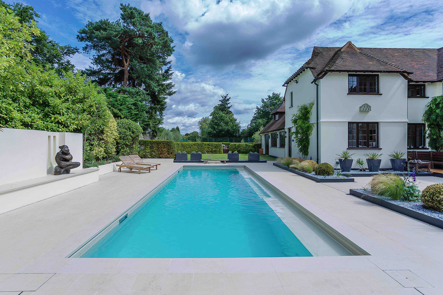 A Bright and Cheerful Modern Home with Courtyard Swimming Pool in Surrey, England by OB Architecture (2)