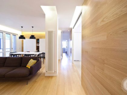A Bright and Luminous Modern Apartment with Wood Accents in Bastia Umbra, Italy by Gianni Amantini (1)