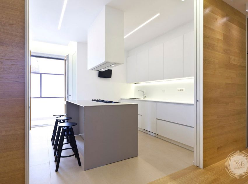 A Bright and Luminous Modern Apartment with Wood Accents in Bastia Umbra, Italy by Gianni Amantini (4)