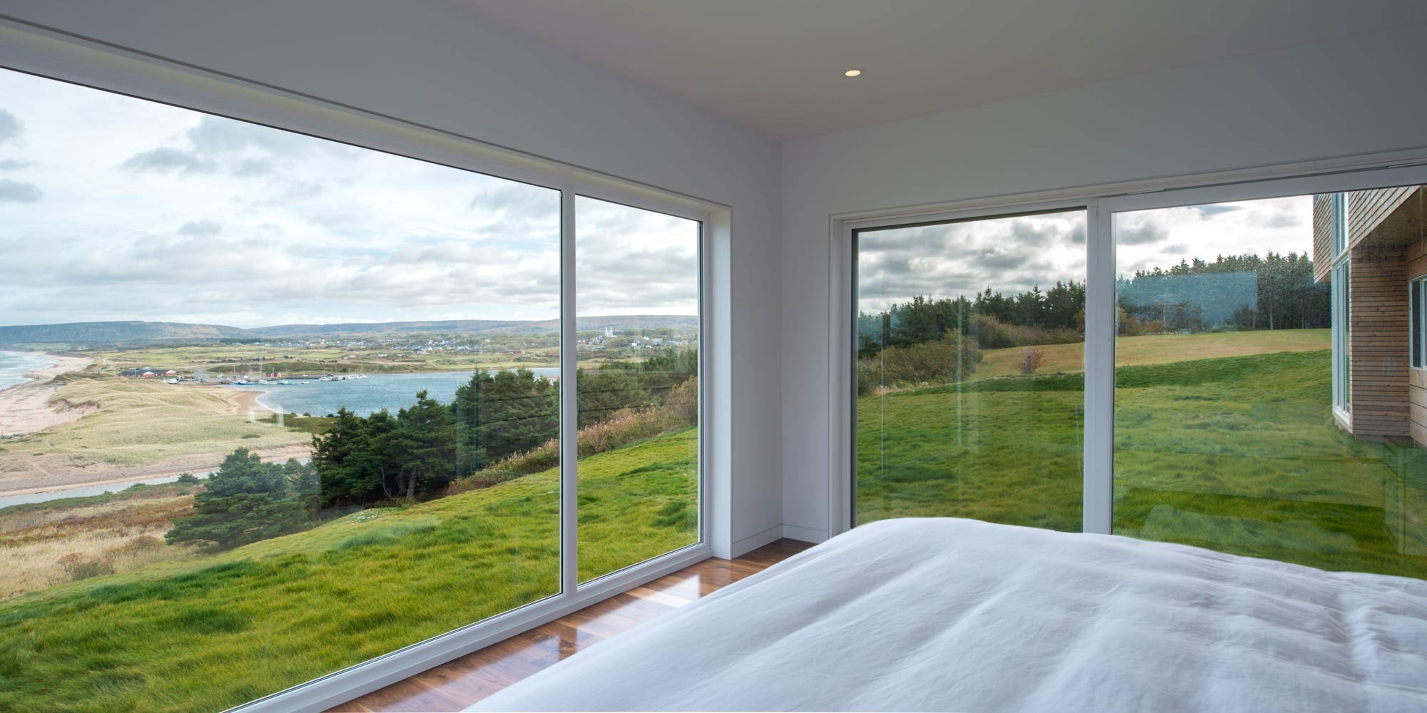 A Bright and Playful Contemporary Home Perched Atop the Hillside of Inverness, Canada by Omar Gandhi Architect (6)