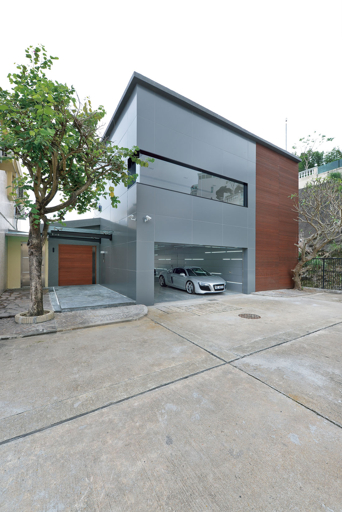 A Bright and Spacious Modern Home for Car Lovers and Enthusiast in Shatin, Hong Kong by Millimeter Interior Design (1)