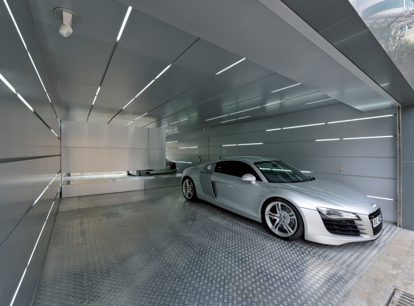 A Bright and Spacious Modern Home for Car Lovers and Enthusiast in Shatin, Hong Kong by Millimeter Interior Design (2)