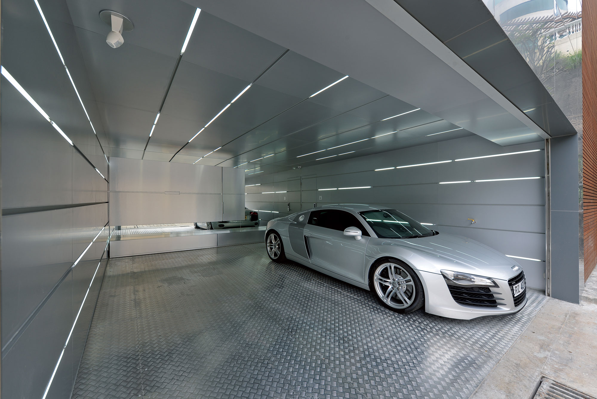 A Bright and Spacious Modern Home for Car Lovers and Enthusiast in Shatin, Hong Kong by Millimeter Interior Design (2)