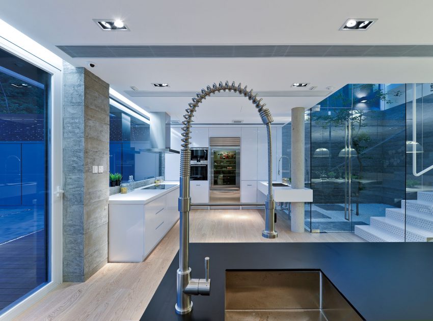 A Bright and Spacious Modern Home for Car Lovers and Enthusiast in Shatin, Hong Kong by Millimeter Interior Design (7)