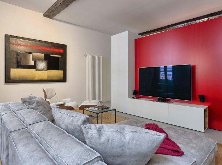 A Chic Contemporary Apartment with Red, Black and White Interiors in Turin, Italy by Archisbang (1)