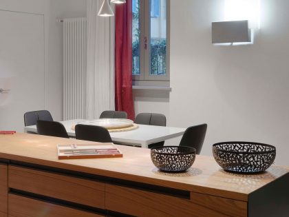 A Chic Contemporary Apartment with Red, Black and White Interiors in Turin, Italy by Archisbang (10)