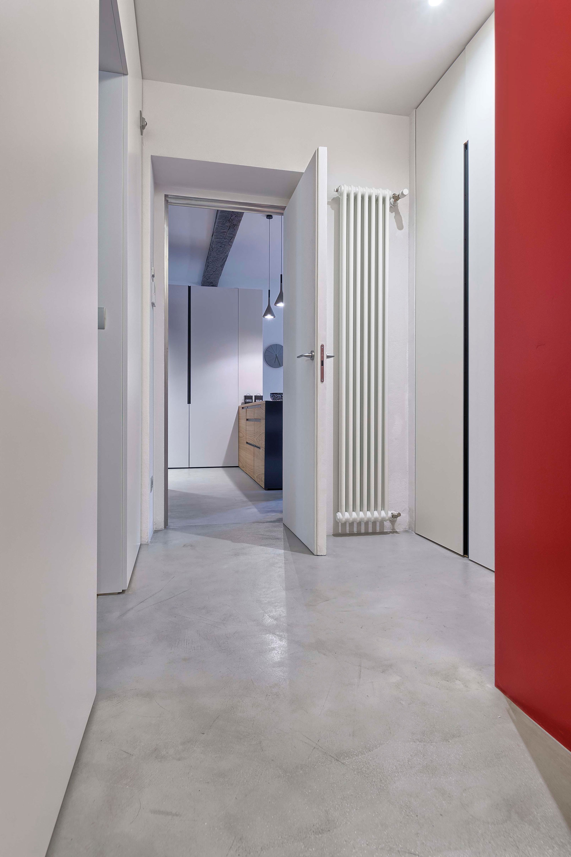 A Chic Contemporary Apartment with Red, Black and White Interiors in Turin, Italy by Archisbang (12)