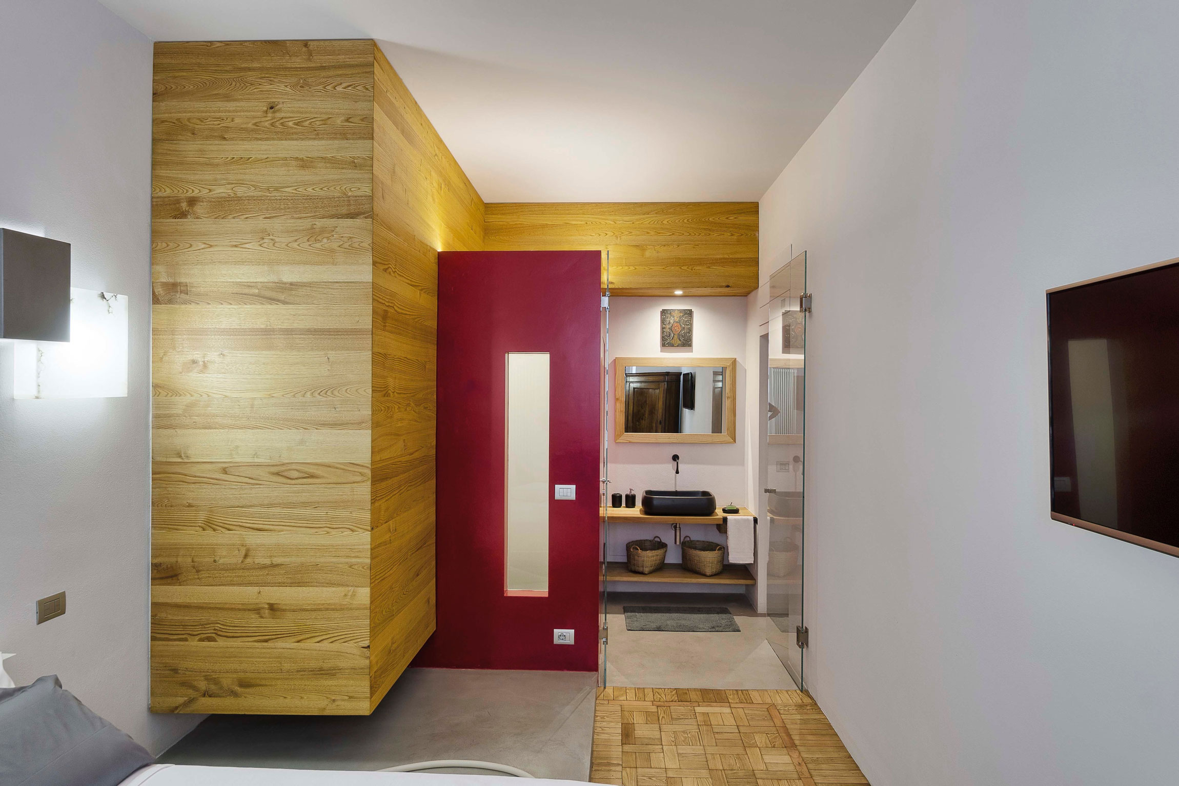 A Chic Contemporary Apartment with Red, Black and White Interiors in Turin, Italy by Archisbang (17)