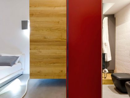 A Chic Contemporary Apartment with Red, Black and White Interiors in Turin, Italy by Archisbang (18)