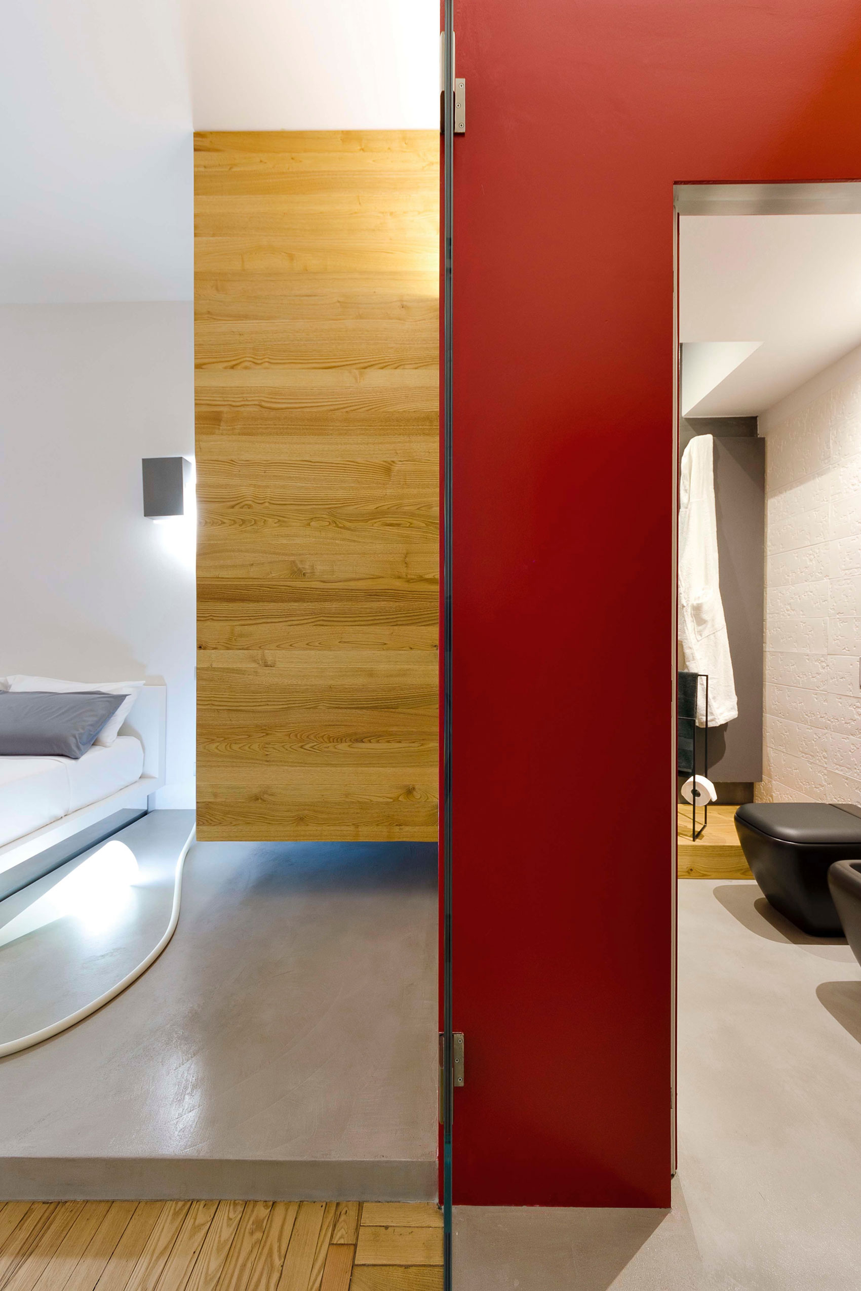 A Chic Contemporary Apartment with Red, Black and White Interiors in Turin, Italy by Archisbang (18)