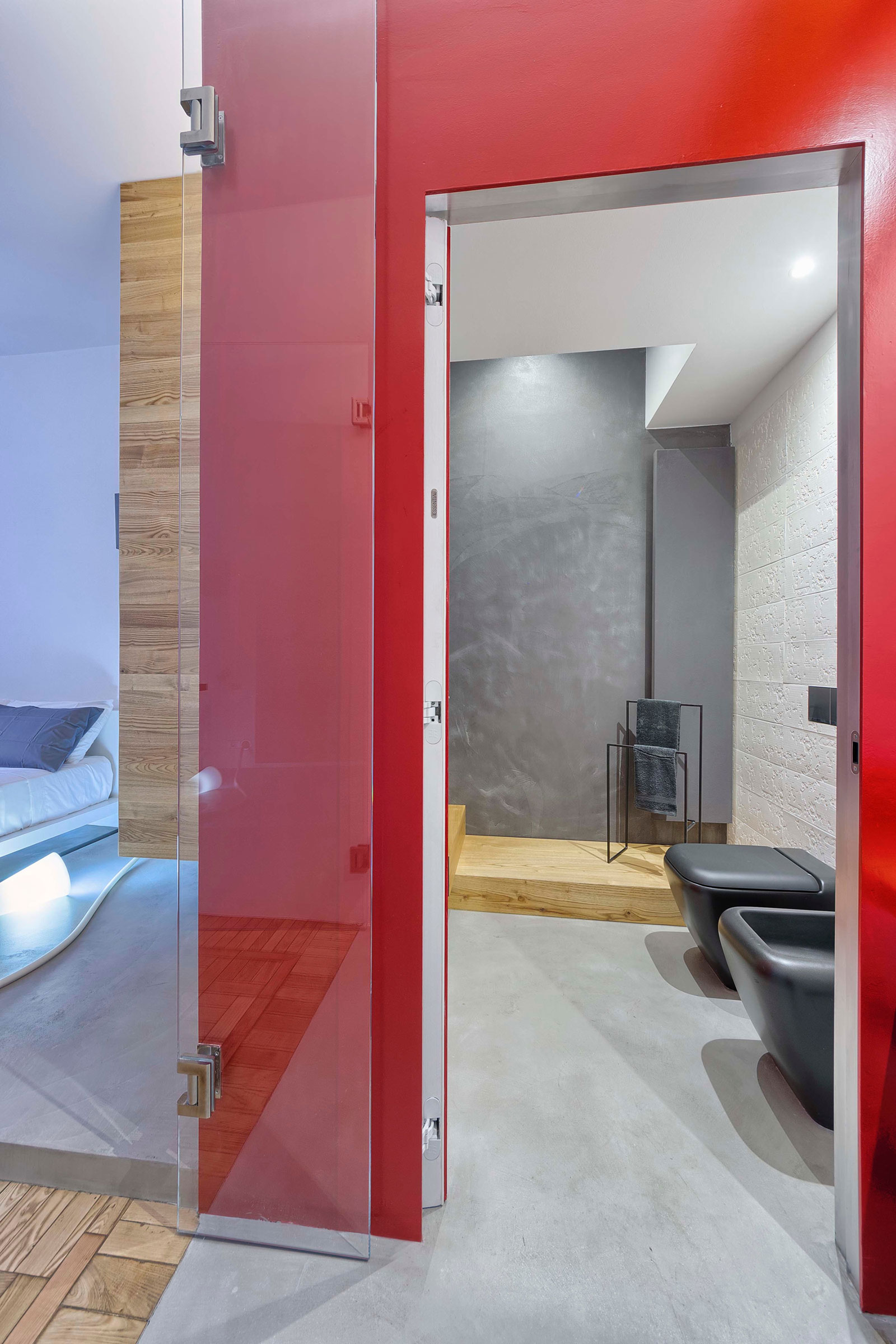 A Chic Contemporary Apartment with Red, Black and White Interiors in Turin, Italy by Archisbang (19)