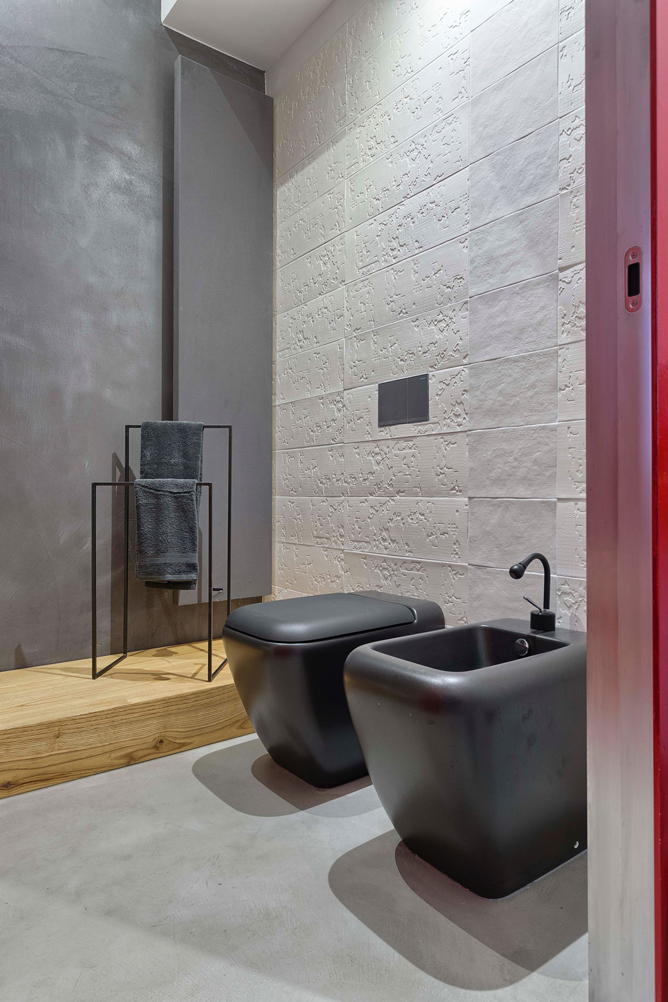 A Chic Contemporary Apartment with Red, Black and White Interiors in Turin, Italy by Archisbang (20)