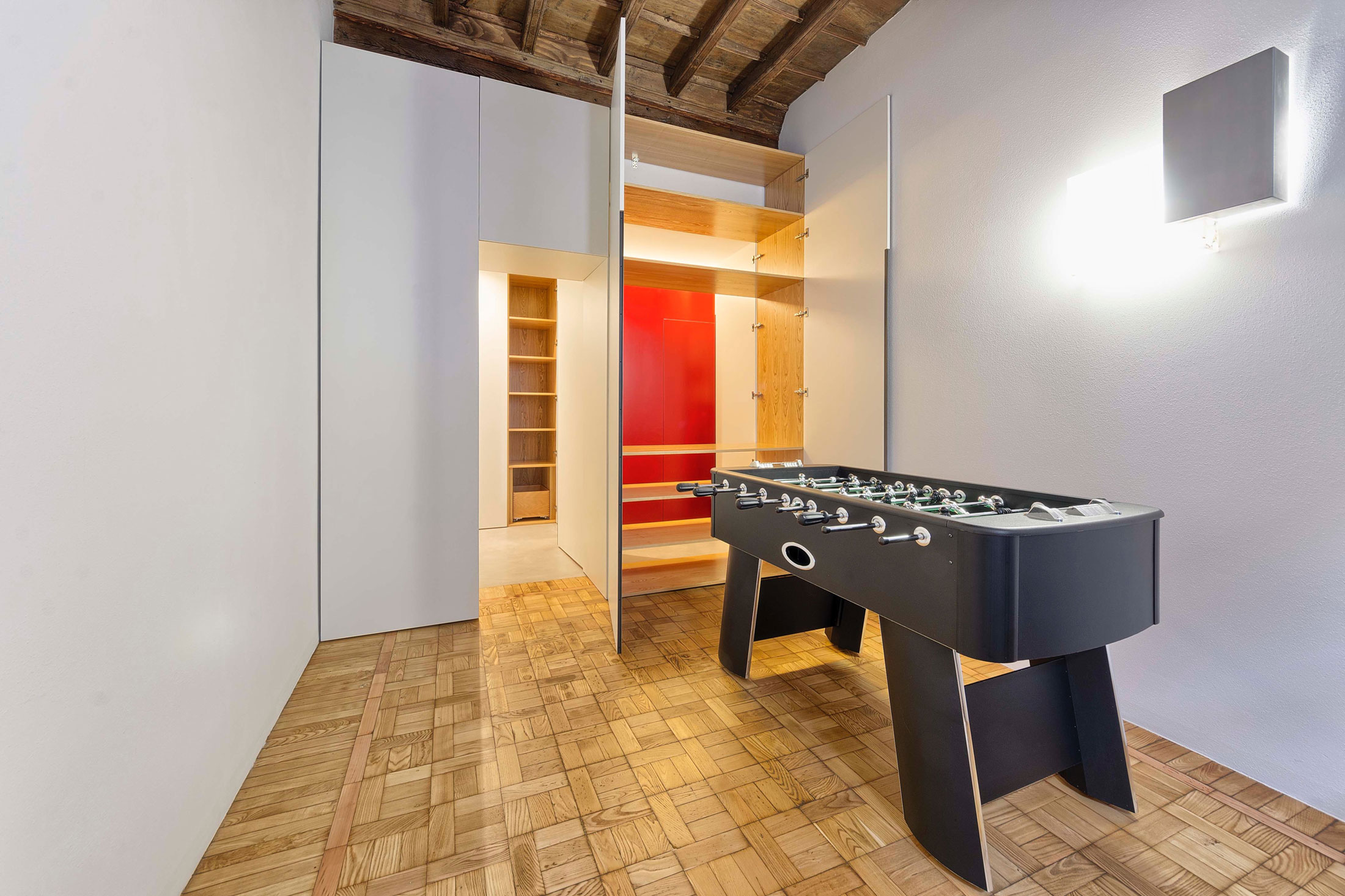 A Chic Contemporary Apartment with Red, Black and White Interiors in Turin, Italy by Archisbang (33)