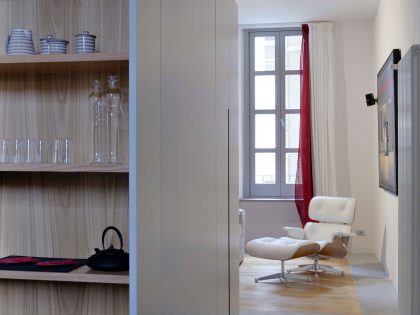 A Chic Contemporary Apartment with Red, Black and White Interiors in Turin, Italy by Archisbang (5)