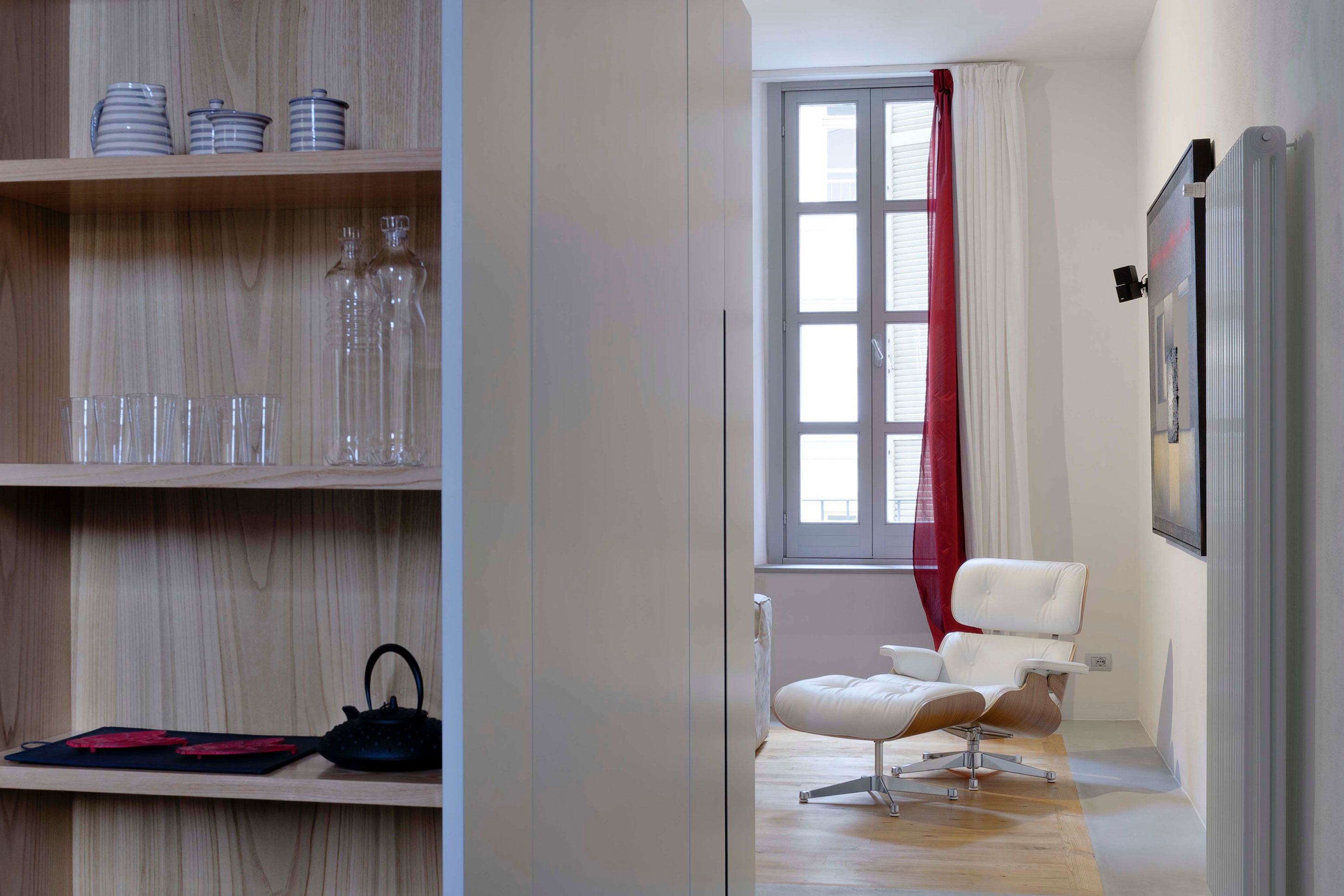 A Chic Contemporary Apartment with Red, Black and White Interiors in Turin, Italy by Archisbang (5)
