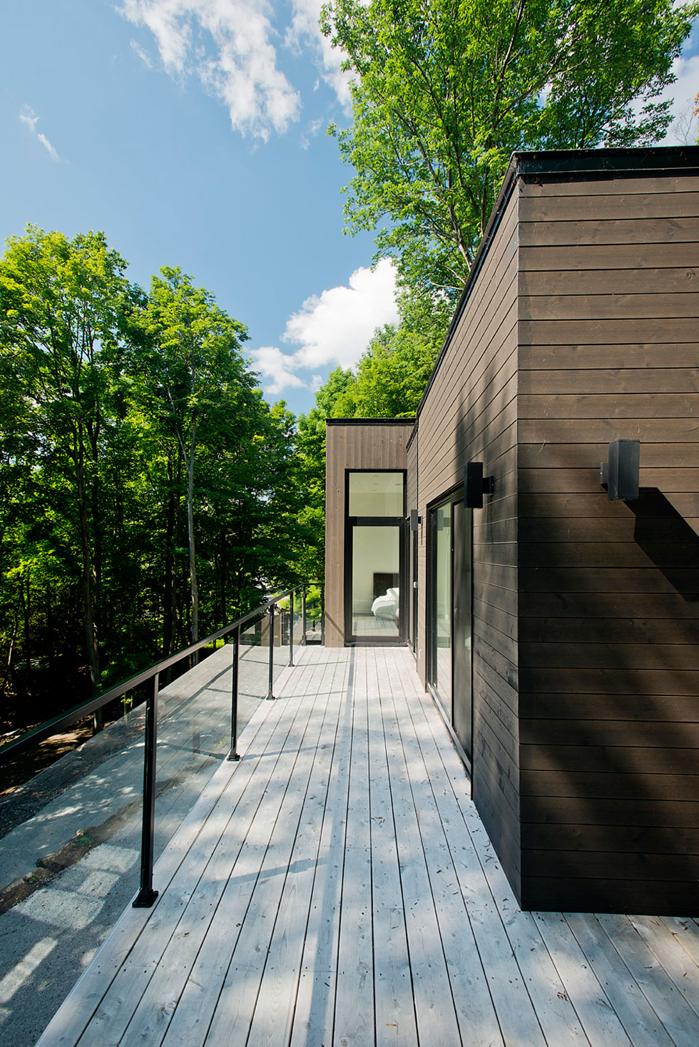 A Contemporary House with a Privileged Natural Environment of Lakes and Mountains in Quebec by Boom Town (16)