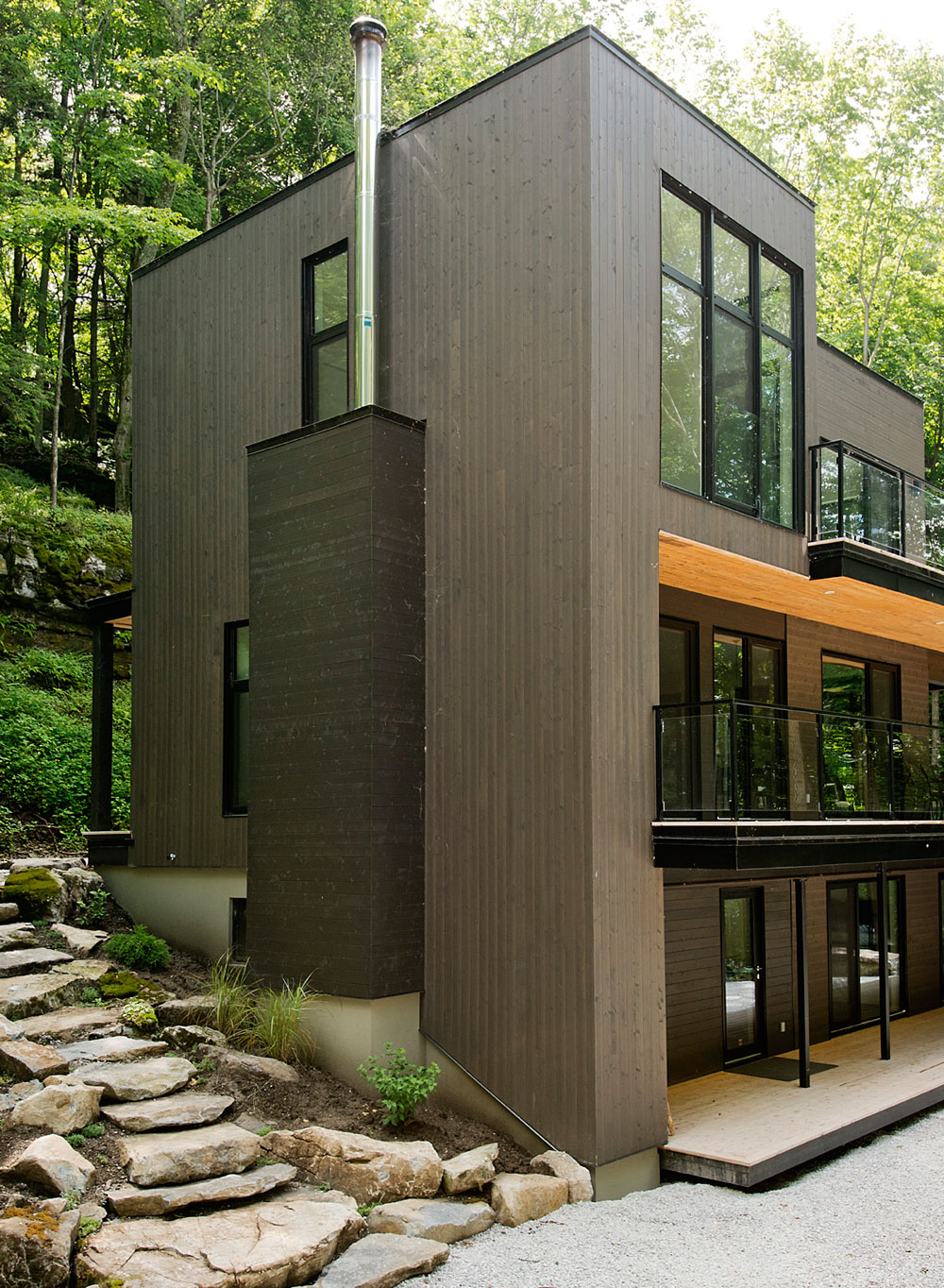 A Contemporary House with a Privileged Natural Environment of Lakes and Mountains in Quebec by Boom Town (19)