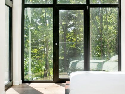 A Contemporary House with a Privileged Natural Environment of Lakes and Mountains in Quebec by Boom Town (32)