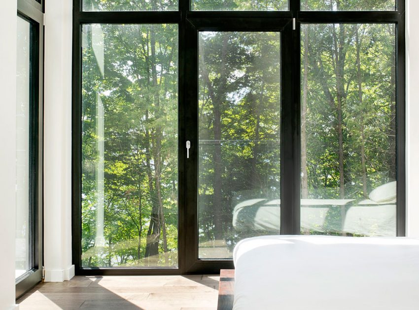 A Contemporary House with a Privileged Natural Environment of Lakes and Mountains in Quebec by Boom Town (32)