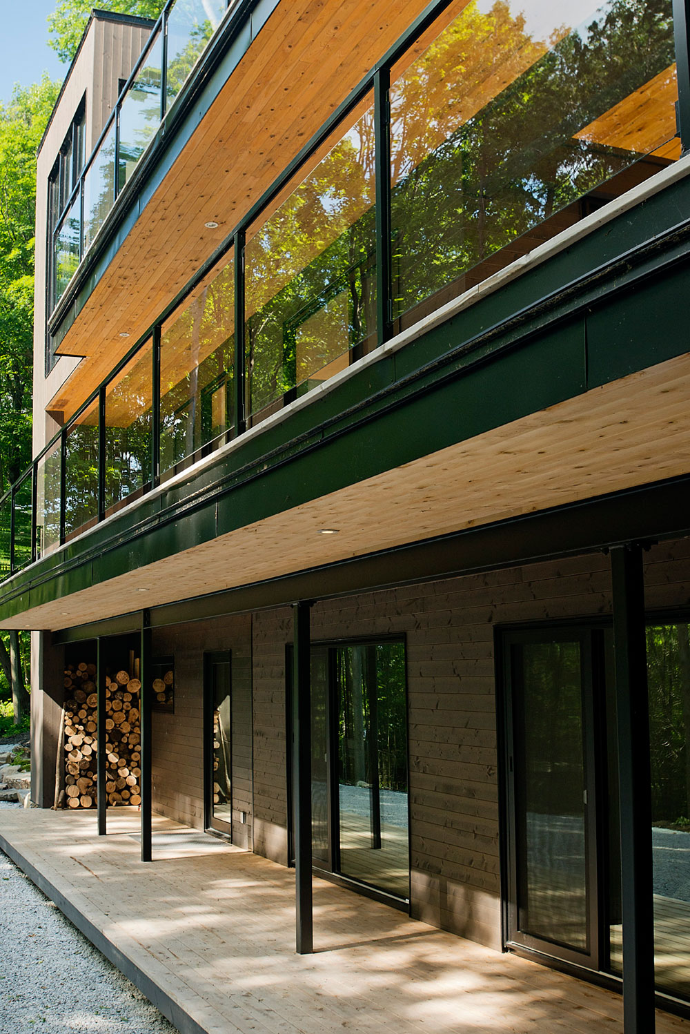 A Contemporary House with a Privileged Natural Environment of Lakes and Mountains in Quebec by Boom Town (4)