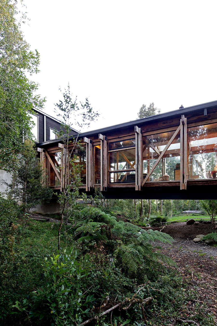 A Dramatic and Rustic Modern Home Shielded by Beautiful Forest in Puerto Varas by Aranguiz-Bunster Arquitectos (15)
