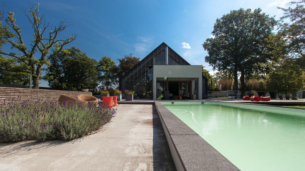 A Former Barnhouse Becomes a Stylish and Colorful Modern Home for a Family in Donderen by aatvos (3)