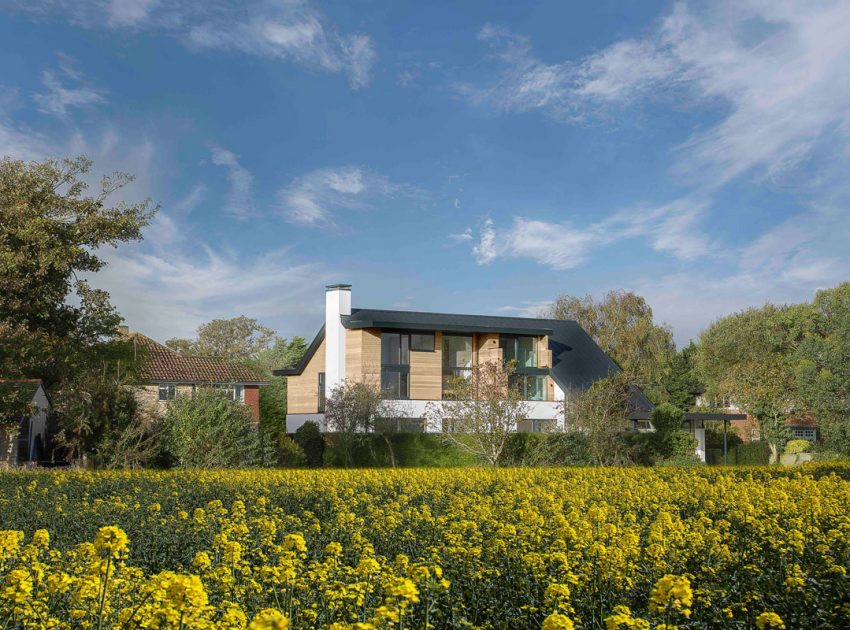 A Luminous Contemporary Home with Pitched Roof and Large Chimney in Hampshire by OB Architecture (1)