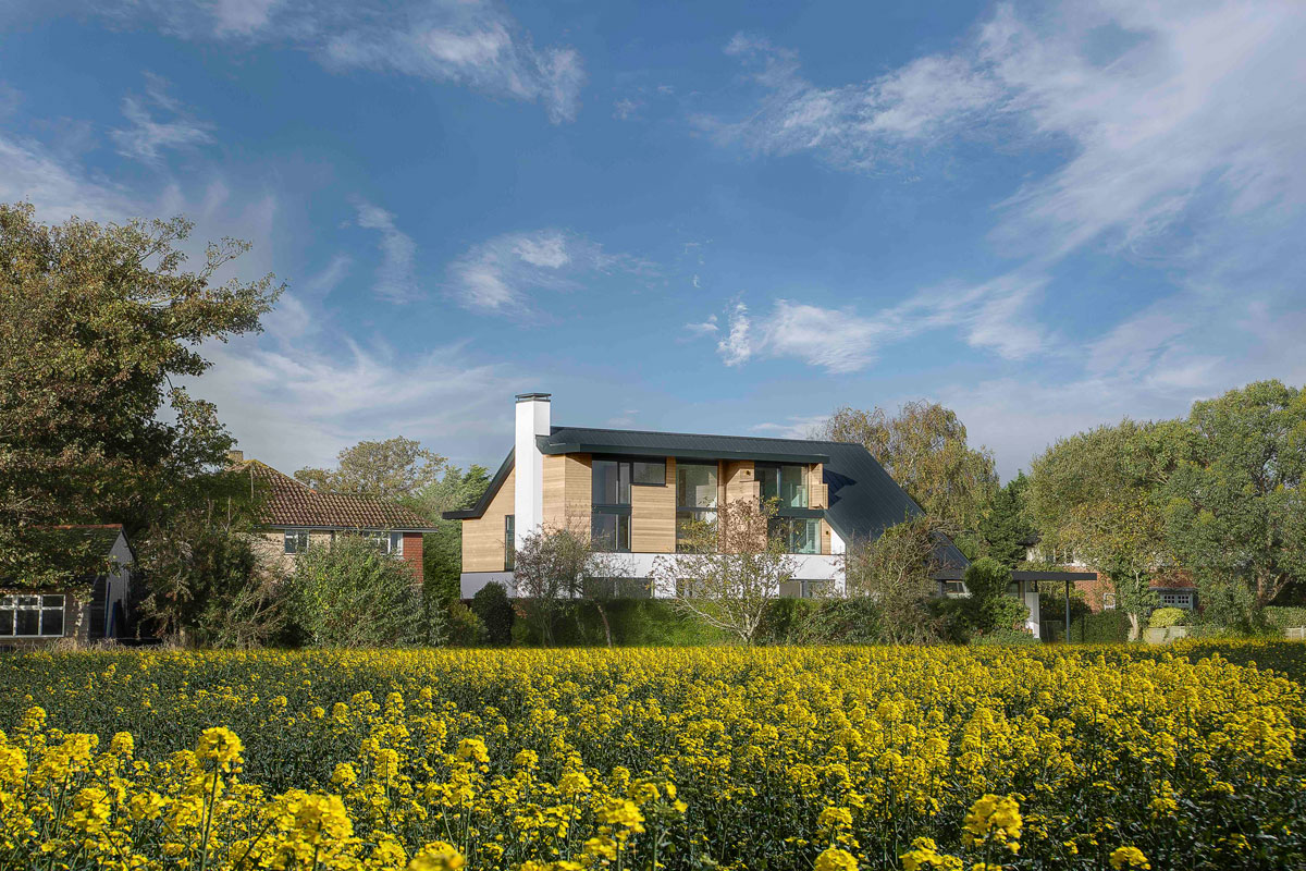 A Luminous Contemporary Home with Pitched Roof and Large Chimney in Hampshire by OB Architecture (1)