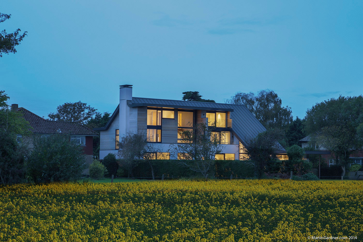 A Luminous Contemporary Home with Pitched Roof and Large Chimney in Hampshire by OB Architecture (15)