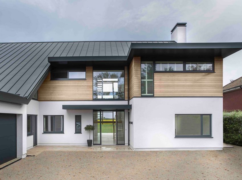 A Luminous Contemporary Home with Pitched Roof and Large Chimney in Hampshire by OB Architecture (3)