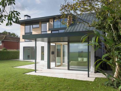 A Luminous Contemporary Home with Pitched Roof and Large Chimney in Hampshire by OB Architecture (5)