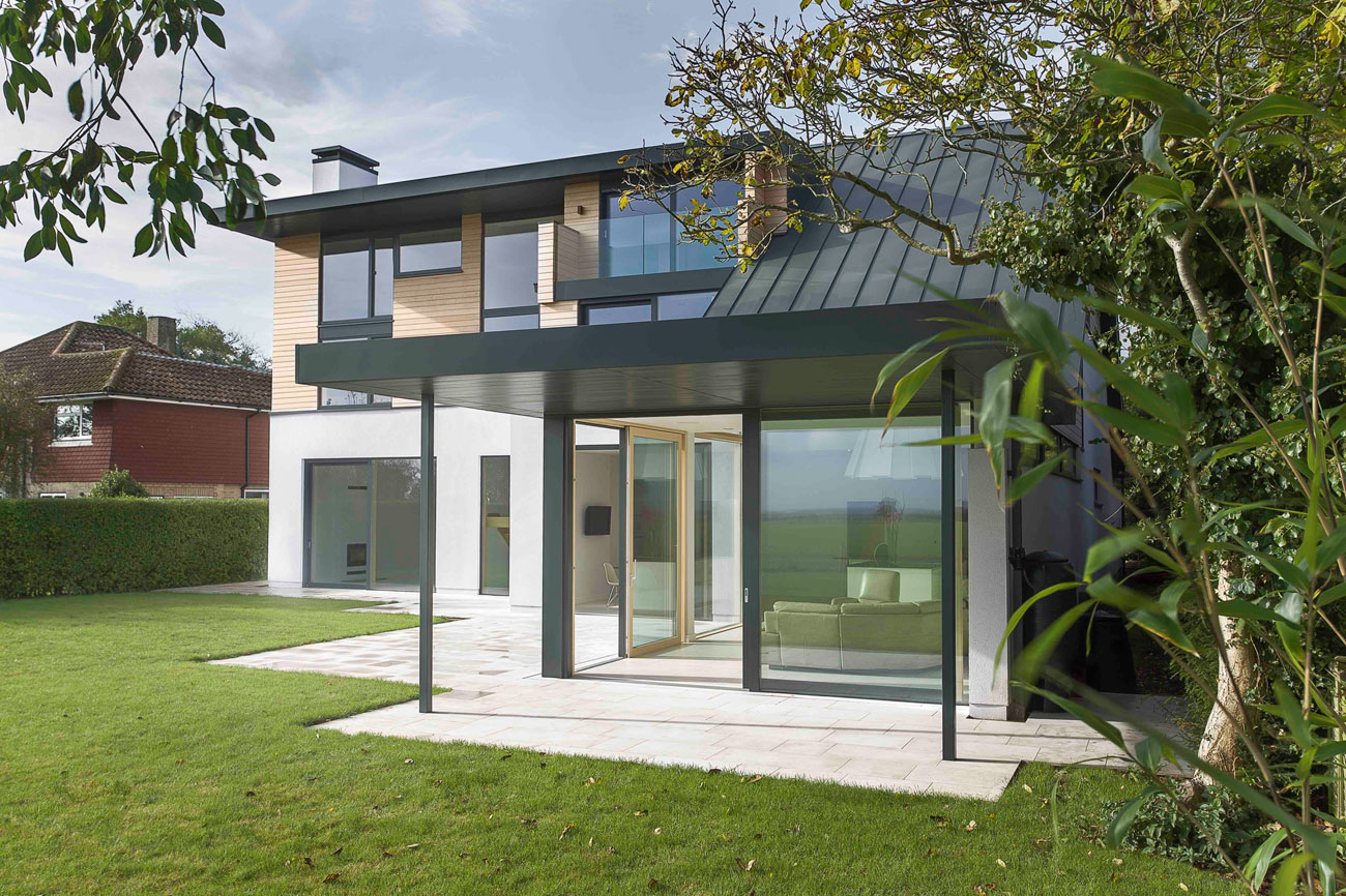A Luminous Contemporary Home with Pitched Roof and Large Chimney in Hampshire by OB Architecture (5)
