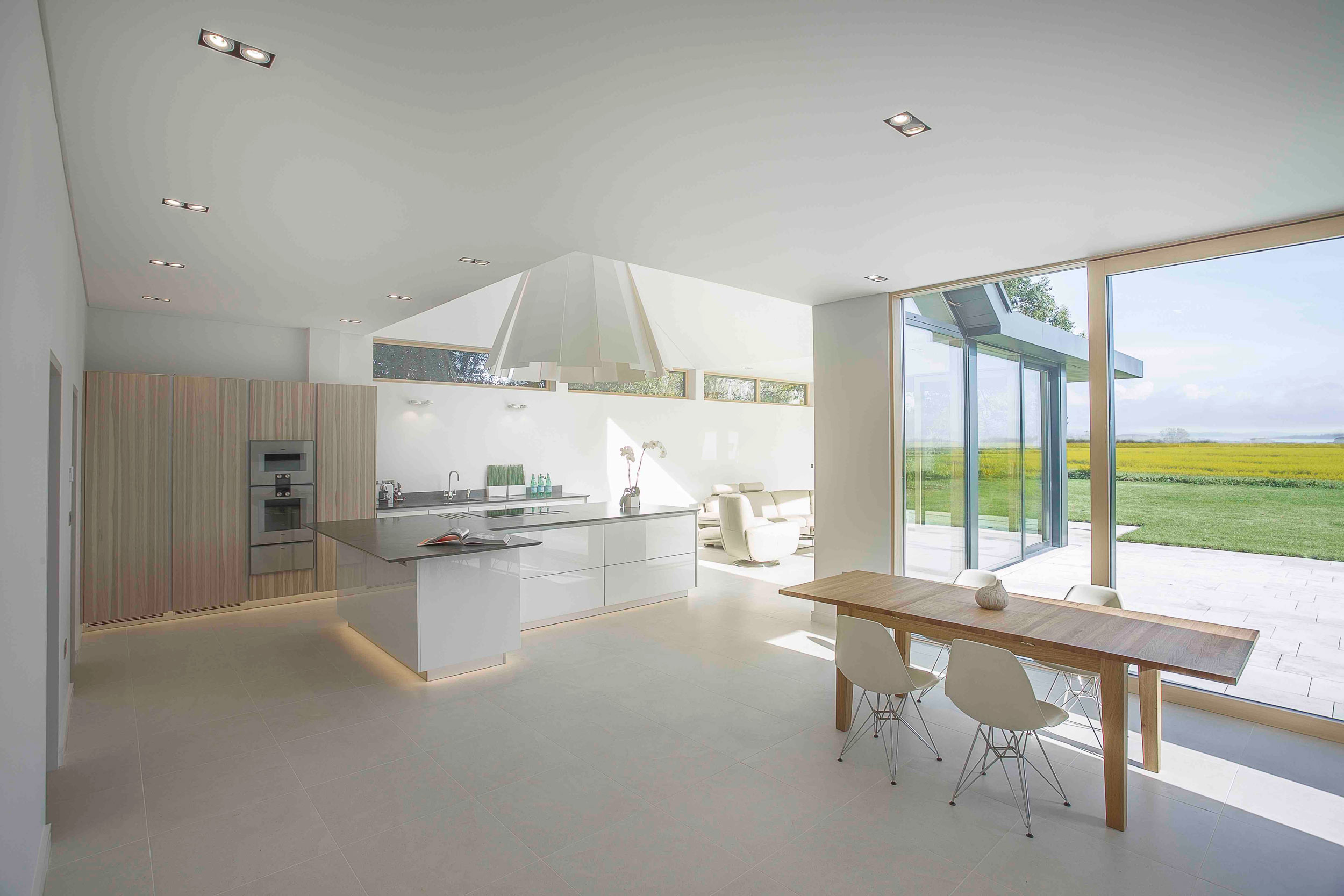 A Luminous Contemporary Home with Pitched Roof and Large Chimney in Hampshire by OB Architecture (6)