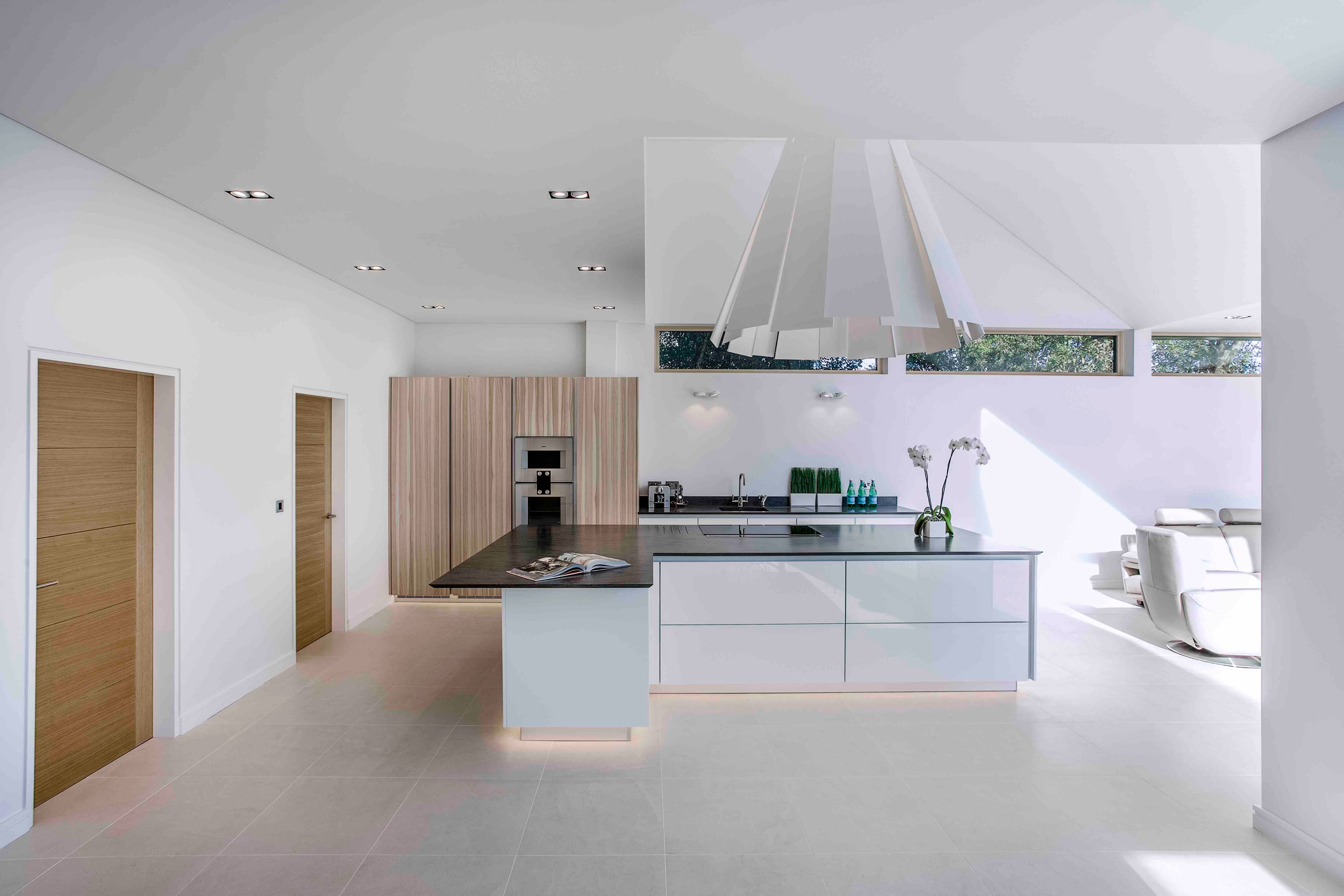 A Luminous Contemporary Home with Pitched Roof and Large Chimney in Hampshire by OB Architecture (7)