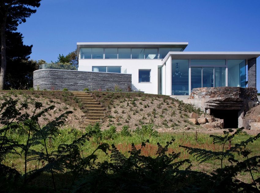 A Luminous Hillside Home with Spectacular Views in Castel, Guernsey by Jamie Falla Architecture (1)