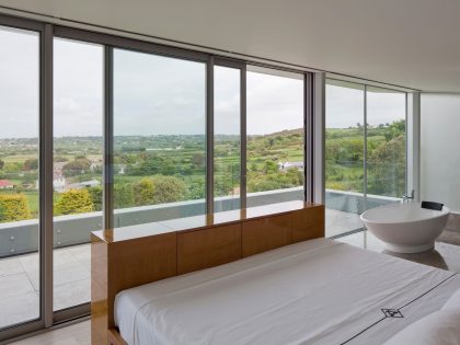 A Luminous Hillside Home with Spectacular Views in Castel, Guernsey by Jamie Falla Architecture (14)