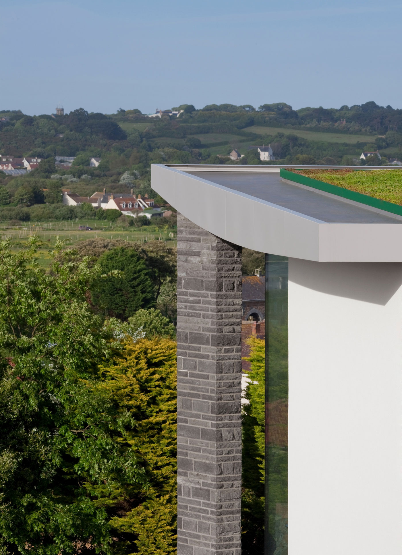 A Luminous Hillside Home with Spectacular Views in Castel, Guernsey by Jamie Falla Architecture (7)