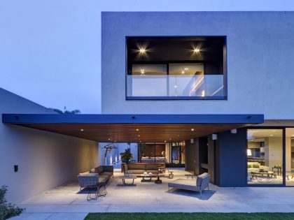 A Modern House Built From Dark Gray Steel, Glass, Wood, Concrete and Stone Materials in Mexico by Elías Rizo Arquitectos (10)