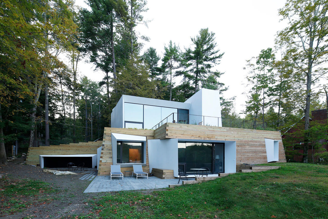 A Modern and Sculptural House on the Banks of Lake Massachusetts by Taylor and Miller Architecture (1)