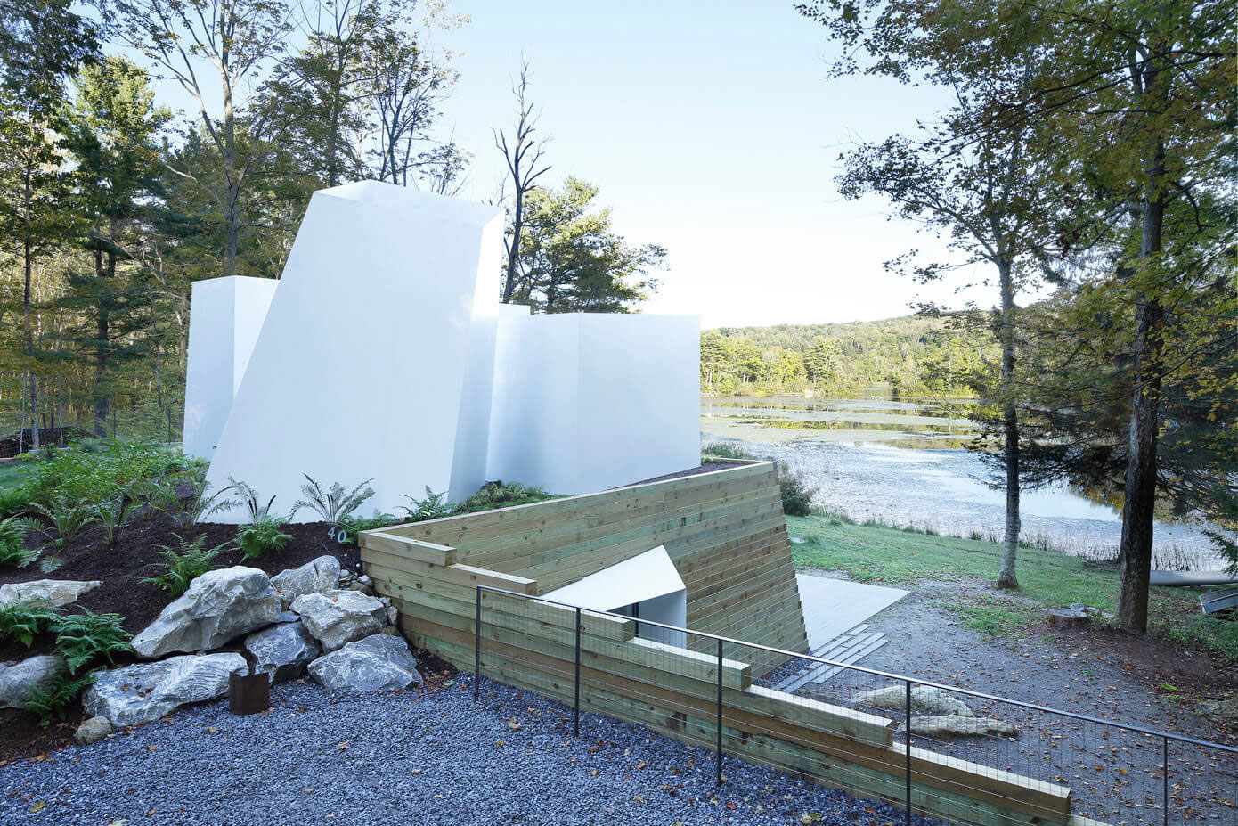 A Modern and Sculptural House on the Banks of Lake Massachusetts by Taylor and Miller Architecture (10)
