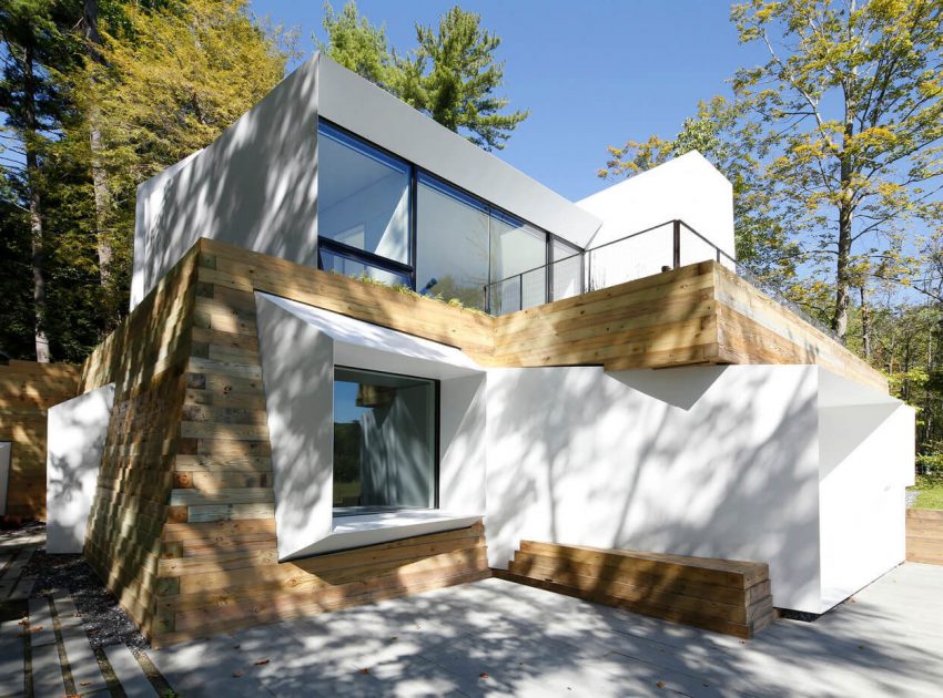 A Modern and Sculptural House on the Banks of Lake Massachusetts by Taylor and Miller Architecture (2)