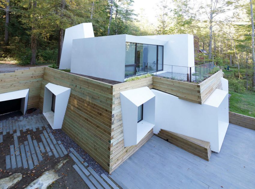 A Modern and Sculptural House on the Banks of Lake Massachusetts by Taylor and Miller Architecture (4)