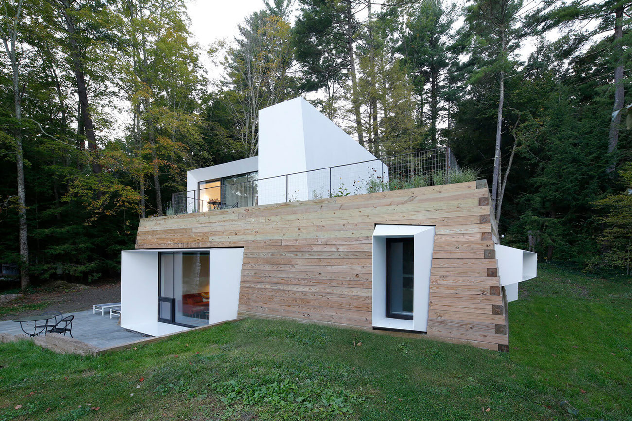 A Modern and Sculptural House on the Banks of Lake Massachusetts by Taylor and Miller Architecture (6)