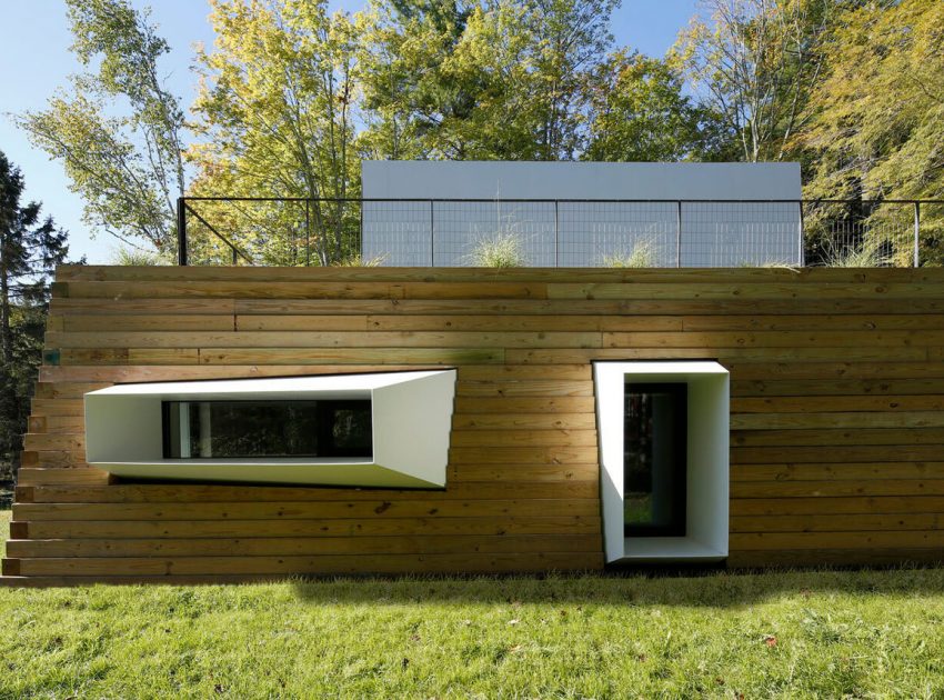 A Modern and Sculptural House on the Banks of Lake Massachusetts by Taylor and Miller Architecture (7)