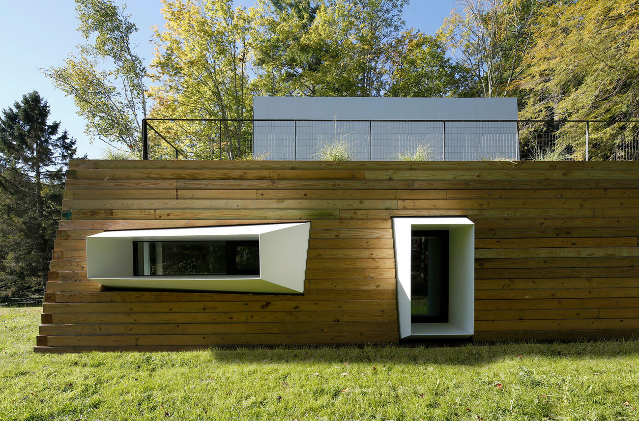 A Modern and Sculptural House on the Banks of Lake Massachusetts by Taylor and Miller Architecture (7)